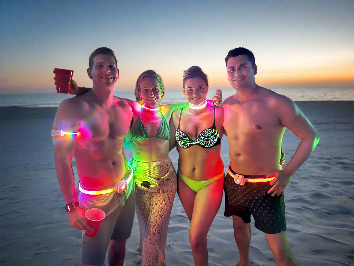 Found, wife, and friends wearing Nion Lights products out on the beach